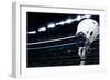 Raised Football Helmet at an American Football Stadium-yobro-Framed Photographic Print