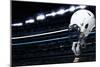 Raised Football Helmet at an American Football Stadium-yobro-Mounted Photographic Print