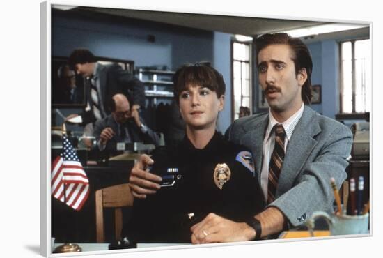 RAISIN ARIZONA, 1987 directed by JOEL AND ETHAN COEN Holly Hunter and Nicolas Cage (photo)-null-Framed Photo