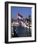 Raising the Dutch Flag by the Harbour, Volendam, Ijsselmeer, Holland-I Vanderharst-Framed Photographic Print