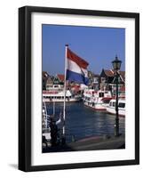 Raising the Dutch Flag by the Harbour, Volendam, Ijsselmeer, Holland-I Vanderharst-Framed Photographic Print