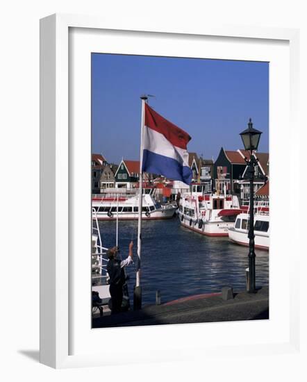 Raising the Dutch Flag by the Harbour, Volendam, Ijsselmeer, Holland-I Vanderharst-Framed Photographic Print