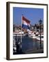 Raising the Dutch Flag by the Harbour, Volendam, Ijsselmeer, Holland-I Vanderharst-Framed Photographic Print