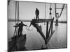 Raising the Truss, Men of the Raising Gang Ride the Swinging Steel 160 Feet Above the Water-Peter Stackpole-Mounted Photographic Print