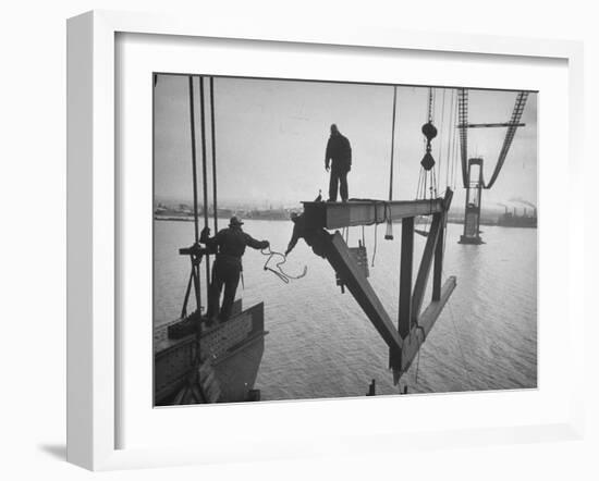 Raising the Truss, Men of the Raising Gang Ride the Swinging Steel 160 Feet Above the Water-Peter Stackpole-Framed Premium Photographic Print