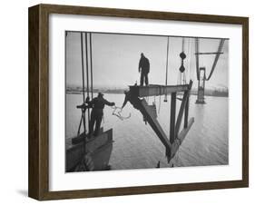 Raising the Truss, Men of the Raising Gang Ride the Swinging Steel 160 Feet Above the Water-Peter Stackpole-Framed Photographic Print