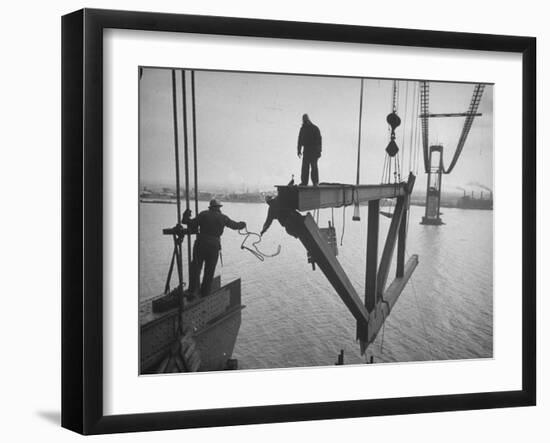 Raising the Truss, Men of the Raising Gang Ride the Swinging Steel 160 Feet Above the Water-Peter Stackpole-Framed Photographic Print