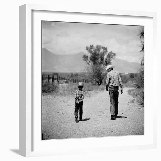 Rancher James A. Shugart Walking a Dusty Road with Son James Jr-Allan Grant-Framed Photographic Print