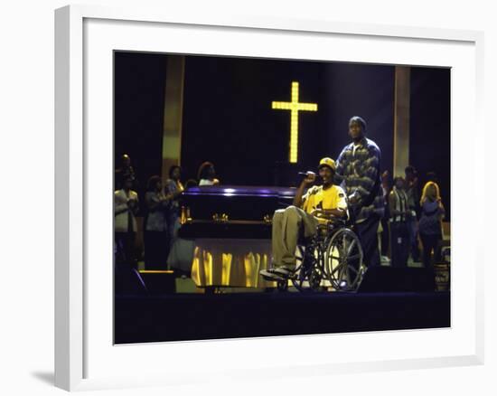 Rapper Snoop Doggy Dogg Performing in a Wheel Chair on Stage at Radio City Music Hall-null-Framed Premium Photographic Print