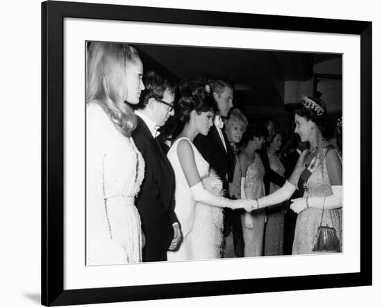 Raquel Welch Meets Queen Elizabeth in 1966 with Woody Allen and Ursula Andress-null-Framed Photographic Print