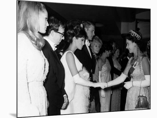 Raquel Welch Meets Queen Elizabeth in 1966 with Woody Allen and Ursula Andress-null-Mounted Photographic Print