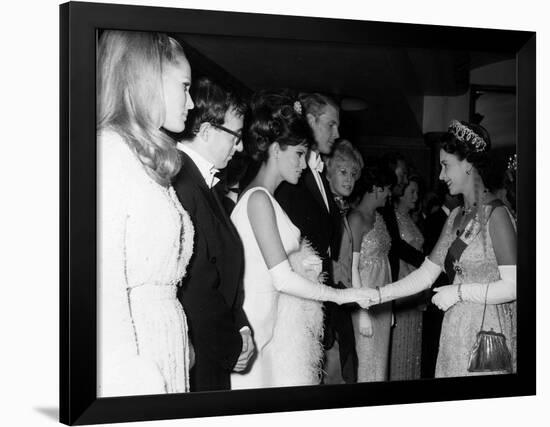 Raquel Welch Meets Queen Elizabeth in 1966 with Woody Allen and Ursula Andress-null-Framed Photographic Print