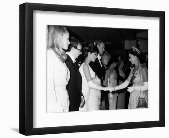 Raquel Welch Meets Queen Elizabeth in 1966 with Woody Allen and Ursula Andress-null-Framed Photographic Print