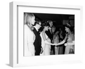Raquel Welch Meets Queen Elizabeth in 1966 with Woody Allen and Ursula Andress-null-Framed Photographic Print