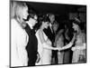 Raquel Welch Meets Queen Elizabeth in 1966 with Woody Allen and Ursula Andress-null-Mounted Photographic Print