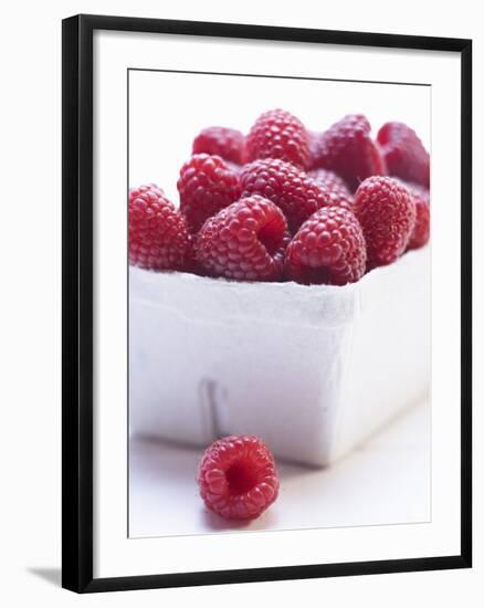 Raspberries in Cardboard Punnet-Claudia Timmann-Framed Photographic Print