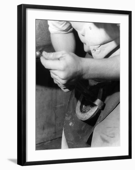 Rasping a Hoof-null-Framed Photographic Print