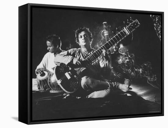 Ravi Shankar Passionately Playing the Sitar-Paul Schutzer-Framed Stretched Canvas