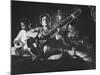 Ravi Shankar Passionately Playing the Sitar-Paul Schutzer-Mounted Premium Photographic Print