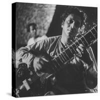 Ravi Shankar Passionately Playing the Sitar-Paul Schutzer-Stretched Canvas