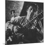 Ravi Shankar Passionately Playing the Sitar-Paul Schutzer-Mounted Premium Photographic Print