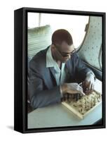 Ray Charles Playing Chess on the Tour Bus-null-Framed Stretched Canvas