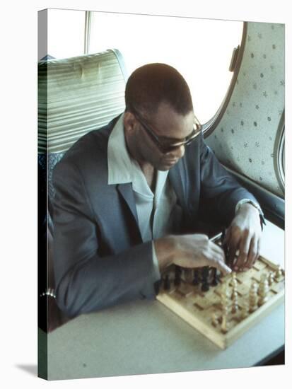 Ray Charles Playing Chess on the Tour Bus-null-Stretched Canvas