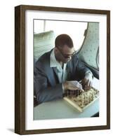 Ray Charles Playing Chess on the Tour Bus-null-Framed Photo