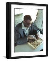 Ray Charles Playing Chess on the Tour Bus-null-Framed Photo