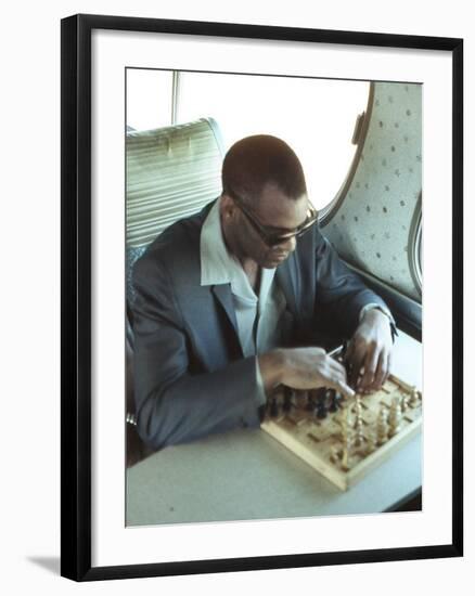 Ray Charles Playing Chess on the Tour Bus-null-Framed Photo