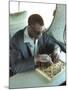 Ray Charles Playing Chess on the Tour Bus-null-Mounted Photo