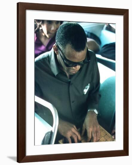 Ray Charles Playing Chess on the Tour Bus-null-Framed Photo