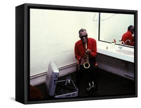 Ray Charles with His Alto Saxophone Backstage-null-Framed Stretched Canvas