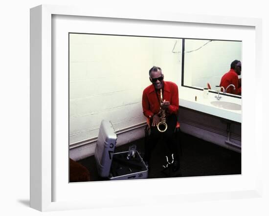 Ray Charles with His Alto Saxophone Backstage-null-Framed Photo