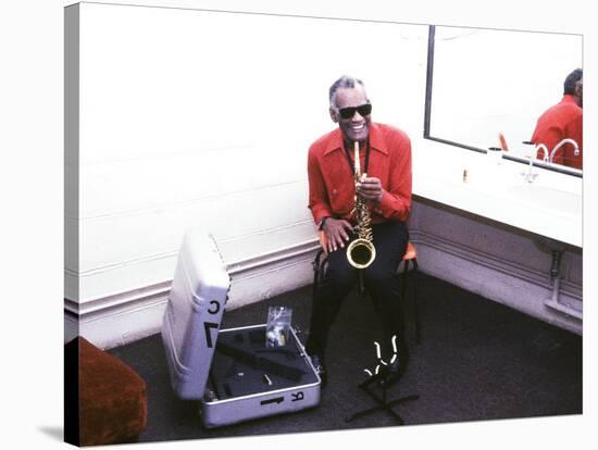 Ray Charles with His Alto Saxophone Backstage-null-Stretched Canvas