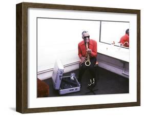 Ray Charles with His Alto Saxophone Backstage-null-Framed Photo