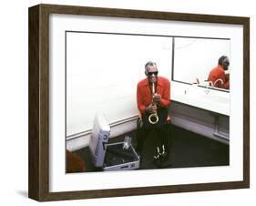 Ray Charles with His Alto Saxophone Backstage-null-Framed Photo