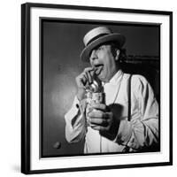 Raymond Devos Eating a Candy-Thérese Begoin-Framed Photographic Print