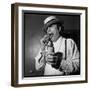 Raymond Devos Eating a Candy-Thérese Begoin-Framed Photographic Print