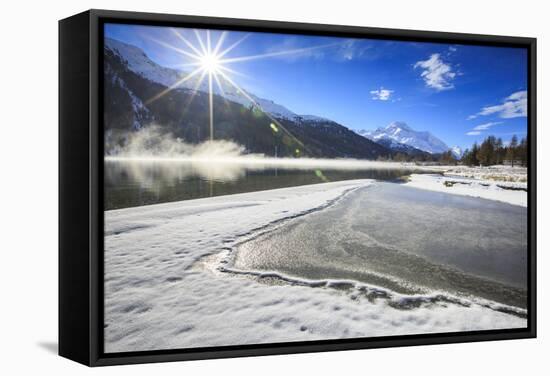 Rays of Winter Sun Illuminate Lake Silvaplana Still Partially Frozen, Switzerland-Roberto Moiola-Framed Stretched Canvas