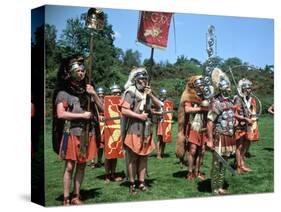 Re-Enactors Dressed as Roman Soldiers-Peter Thompson-Stretched Canvas