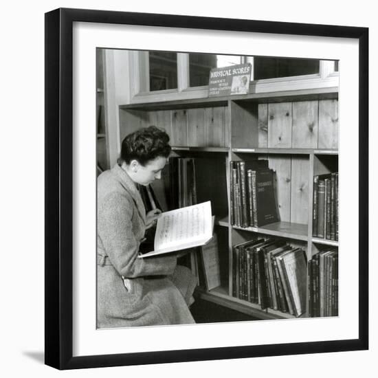 Reading a Score in a Music Library-null-Framed Photographic Print