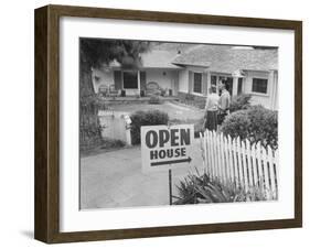 Realtor Pat Devault Showing a House to Her Clients-J^ R^ Eyerman-Framed Photographic Print