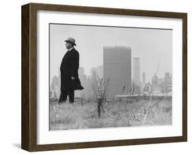 Realtor William J. Zeckendorf, Standing in the Wind Fields Located on the Outskirts of the City-John Loengard-Framed Premium Photographic Print