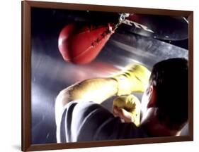 Rear View of a Boxer Punching a Punching Bag-null-Framed Photographic Print