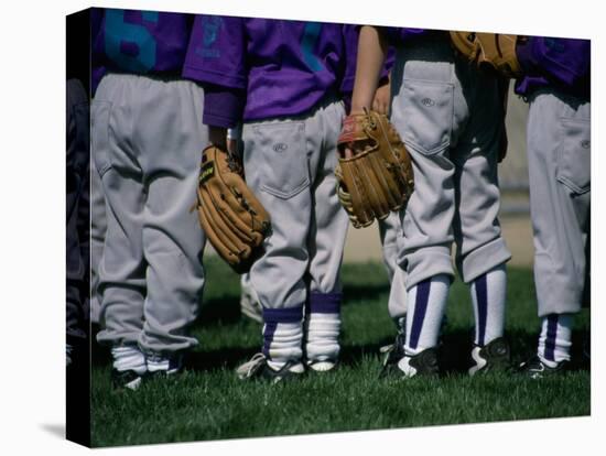 Rear View of a Little League Baseball Team Standing in a Row-null-Stretched Canvas