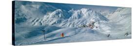 Rear View of a Person Skiing in Snow, St. Christoph, Austria-null-Stretched Canvas