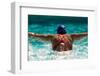 Rear view of a woman swimming the butterfly stroke in a swimming pool, Bainbridge Island, Washin...-Pete Saloutos-Framed Photographic Print