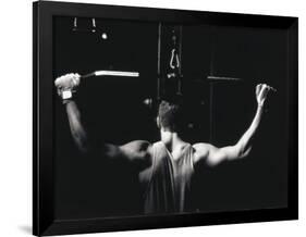 Rear View of a Young Man Exercise on a Lateral Pull-Down Weight Machine-null-Framed Photographic Print