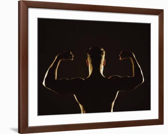 Rear View of a Young Man Flexing His Muscles-null-Framed Photographic Print